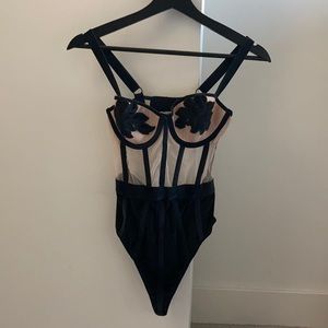 Sexy black and nude bodysuit